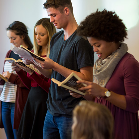 Students in Honors Program reading together