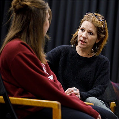 Counselor talking with a patient