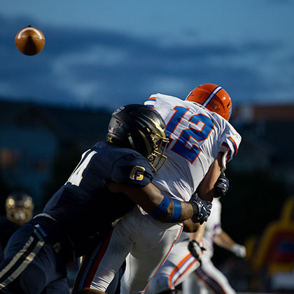 football tackle during the game