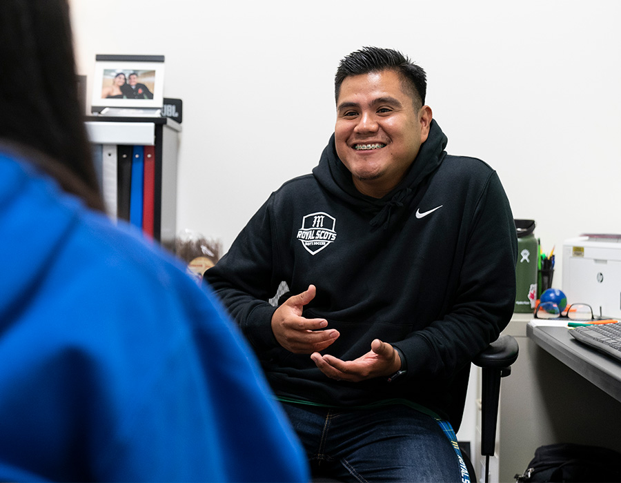 School counselor talking with a student