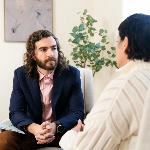 patient speaking with a counselor