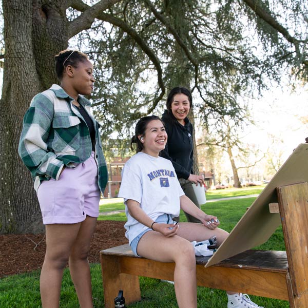 students draw outside