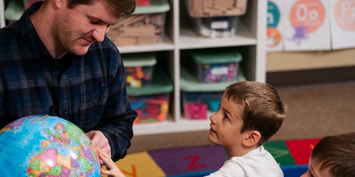 student with a teacher