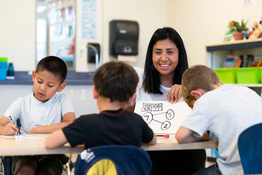 Teacher with students