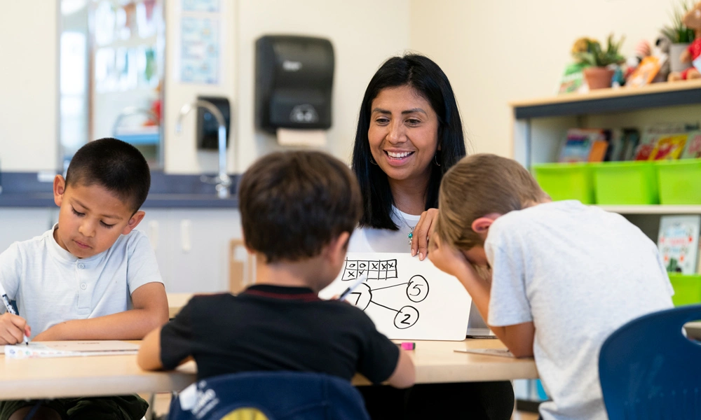 Mila Menneally teaching a group of students
