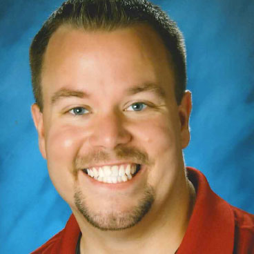 Image of Jon Archer in a red shirt