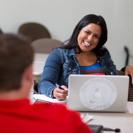 teacher interacting with an ESOL student