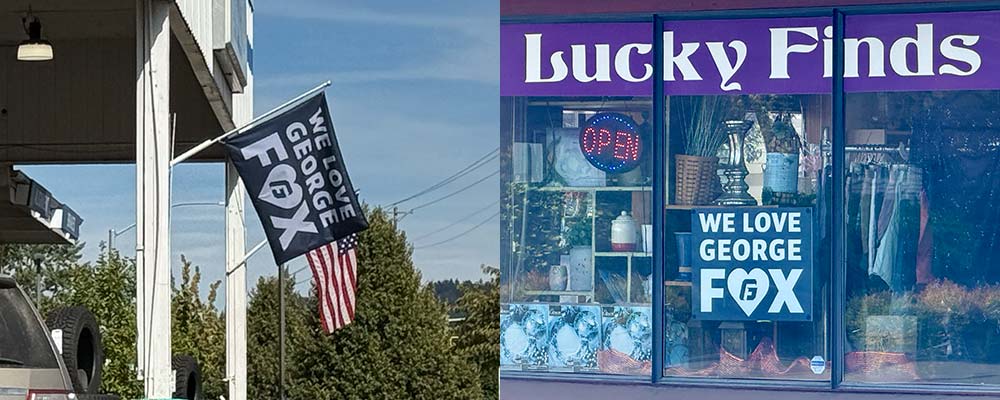 Point S Tires with a "We Love George Fox" flag outside of it, and Lucky Finds with a "We Love George Fox" sign in the window