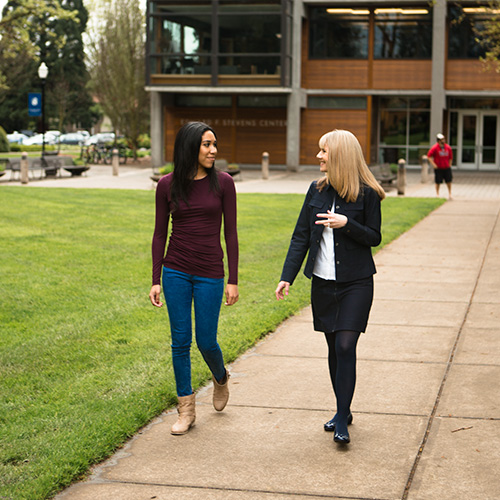 A student with her mentor having a conversation