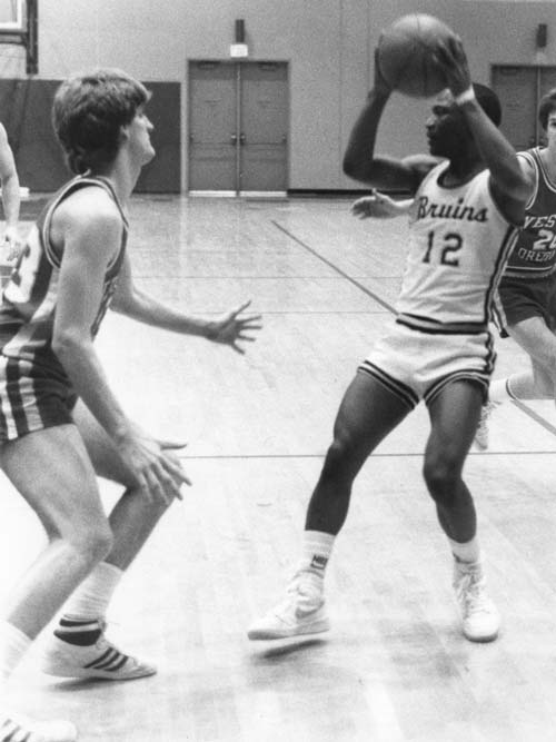 Black and white photo of Harrison playing for the Bruins in the 1980s