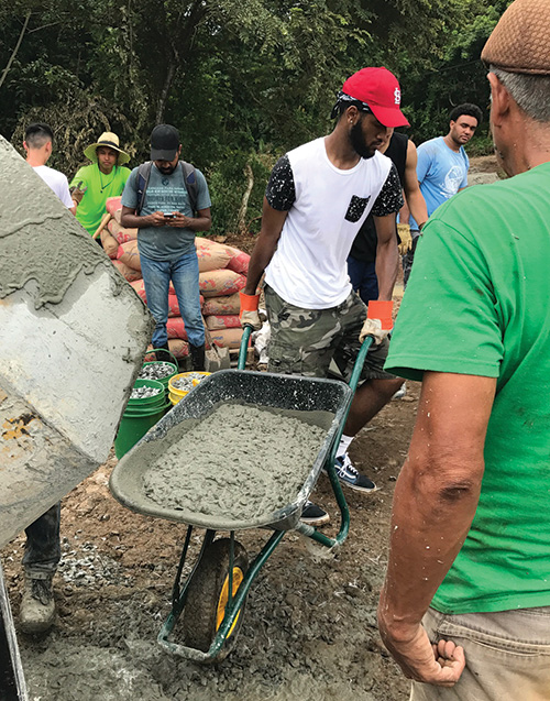 Men's Basketball team builds court in Panama
