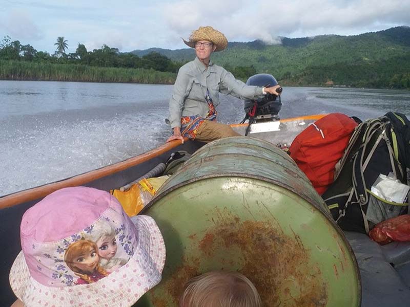 Mary piloting a boat