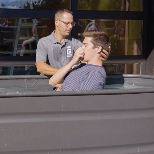 1 of 4 photos of Patrick being baptized in the tub