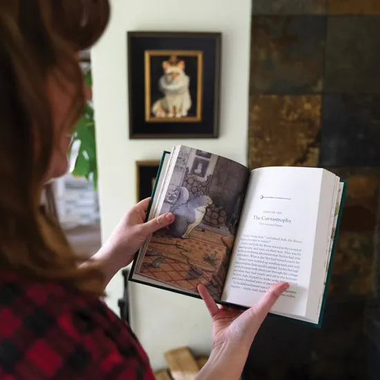 Christine Joy shows off her illustrated book