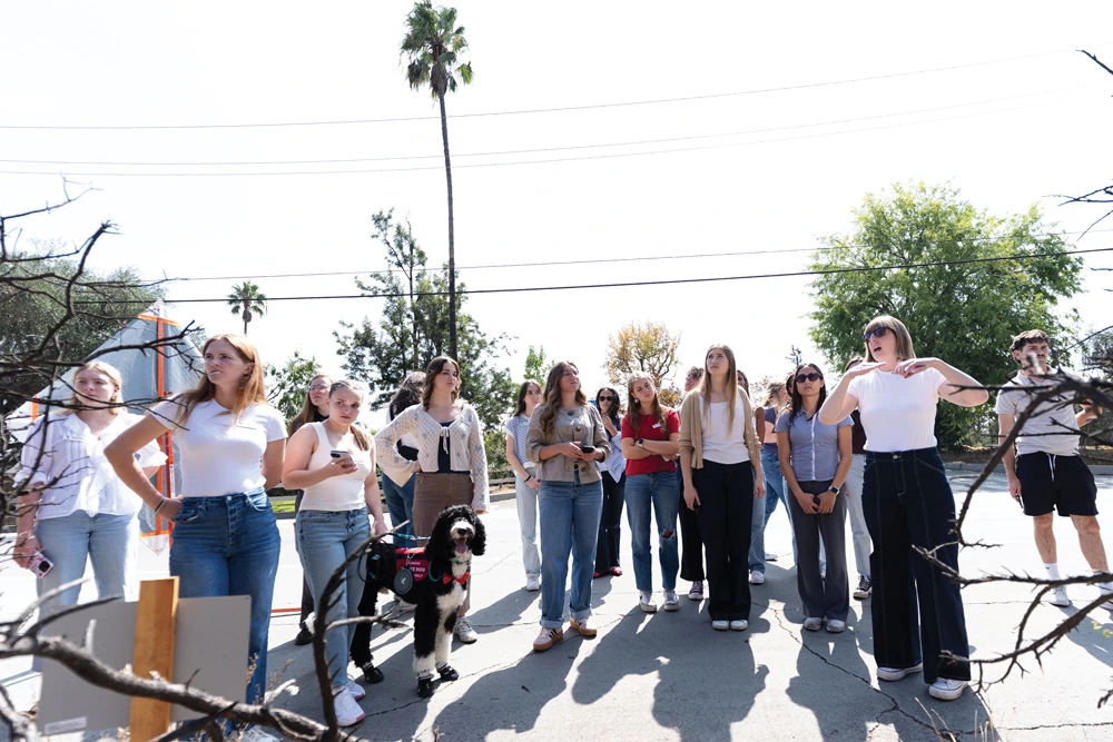 Martin talking to her students about the effect of the Altadena fires on-site