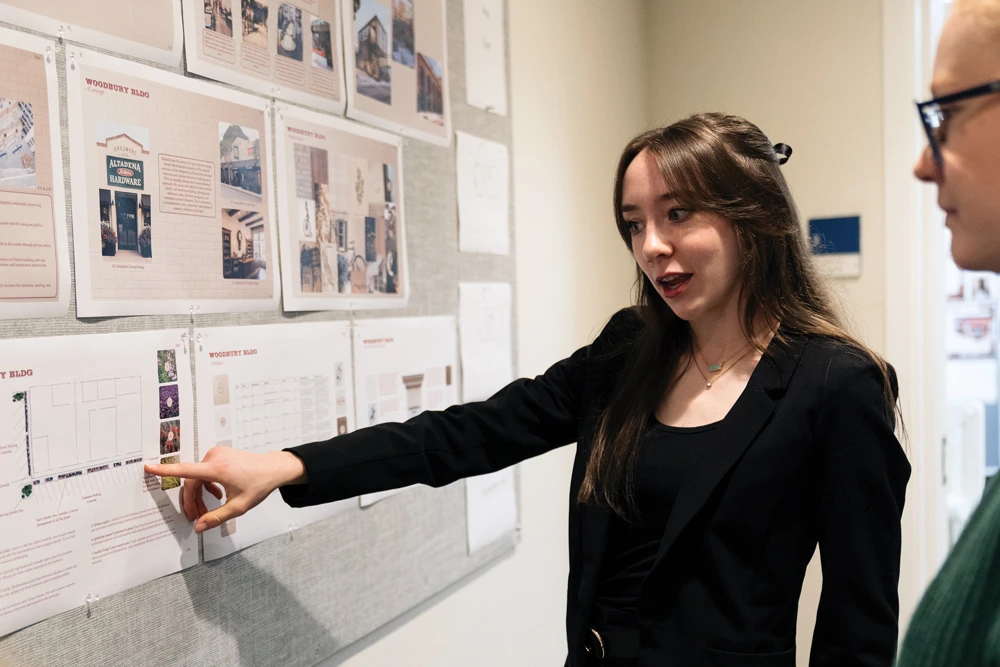 students reviewing building plans to be sent to families affected by Altadena fires