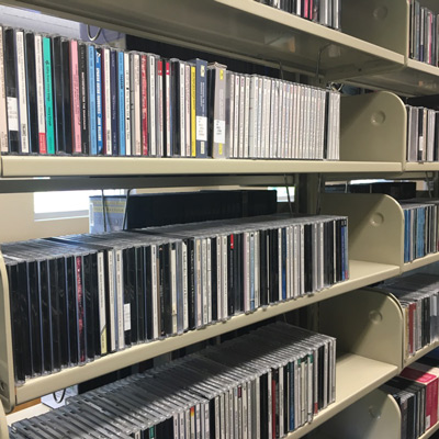 Library shelves filled with CDs