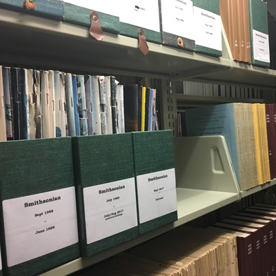 Library shelves filled with magazines