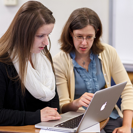 A student getting help on her writing project