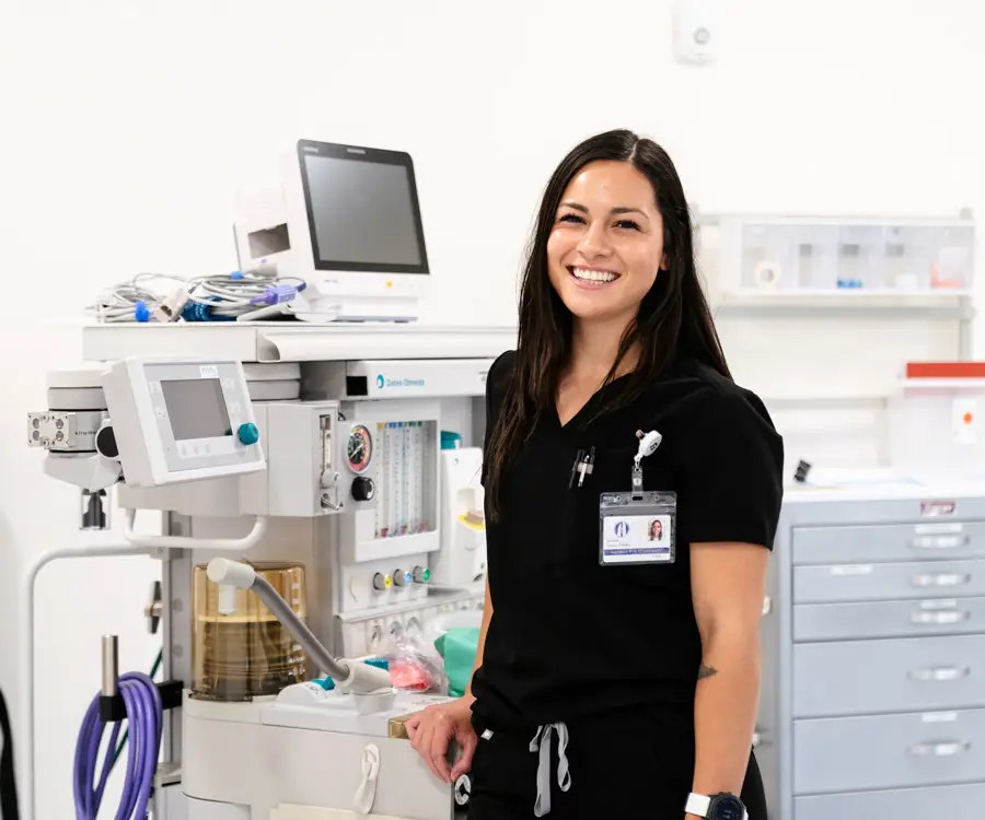 CRNA nurse laughs with a patient 