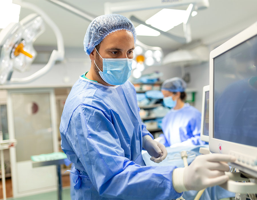 Anesthetist working in operating theatre