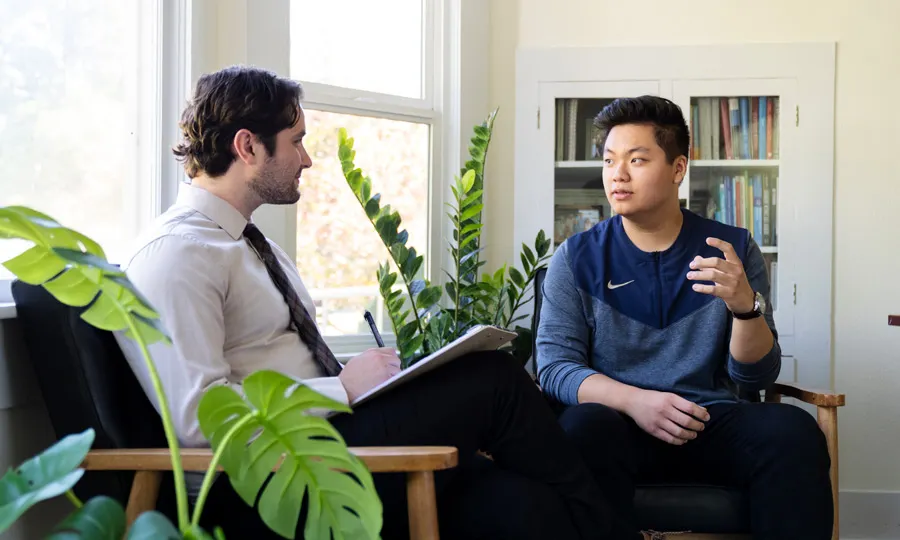 Two students run through a simulation together