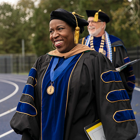 Provost Andrea Scott entering to the stadium for the commencement ceremony