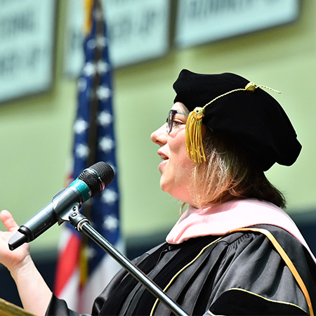 Commencement speaker on the podium