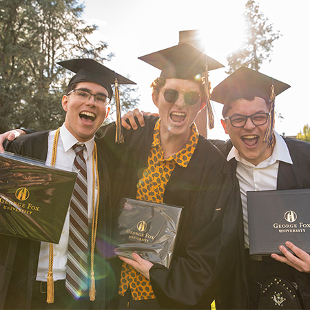 A graduate looking joyful and excited