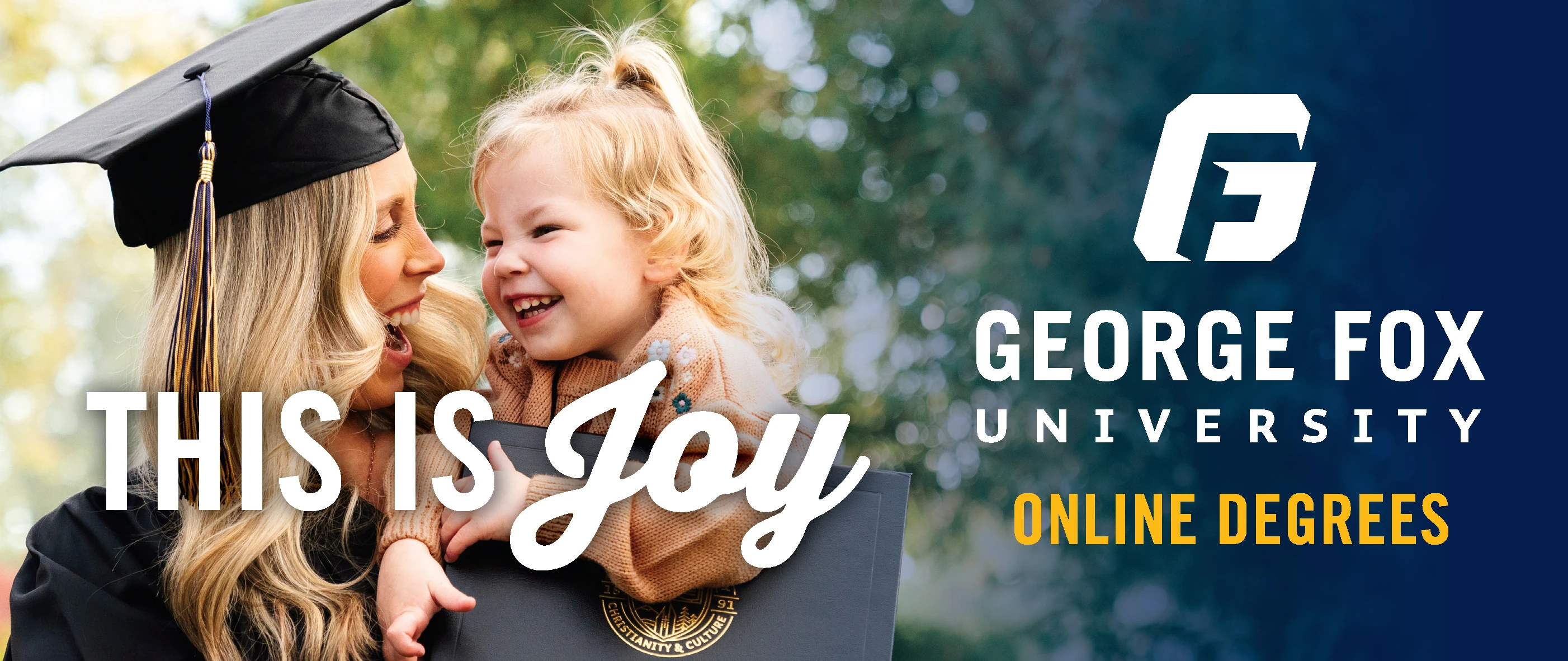 billboard of an adult online degree graduate smiling with her daughter with 'this is joy' in large text