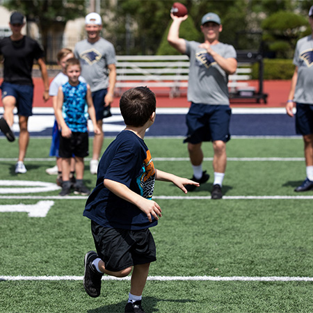 Children running at a sports camp