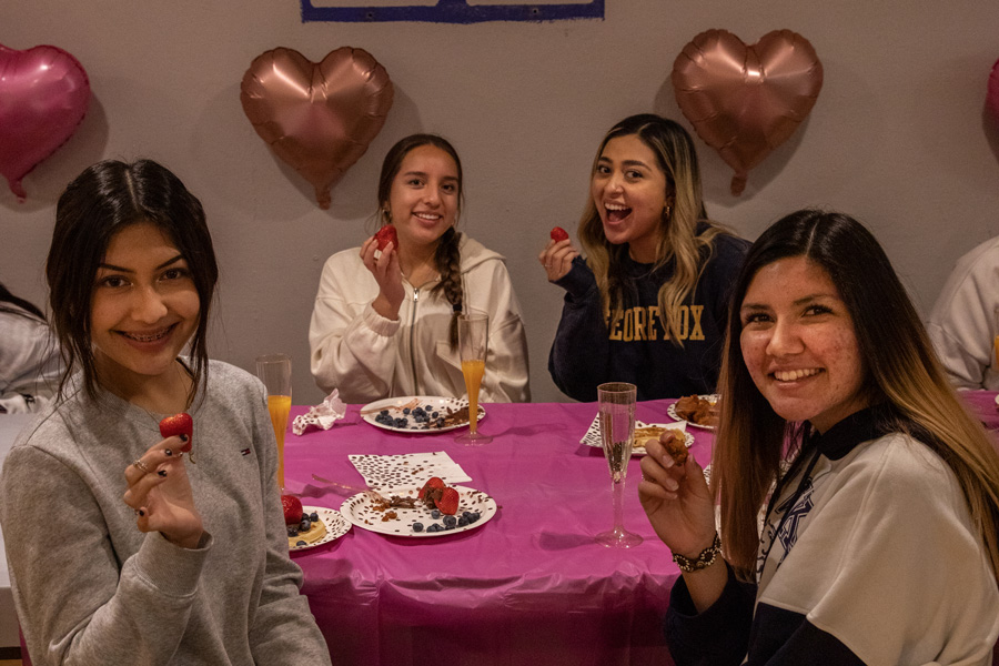 women students at a women of color collective event