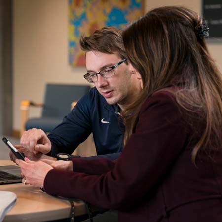 IT staff helping someone