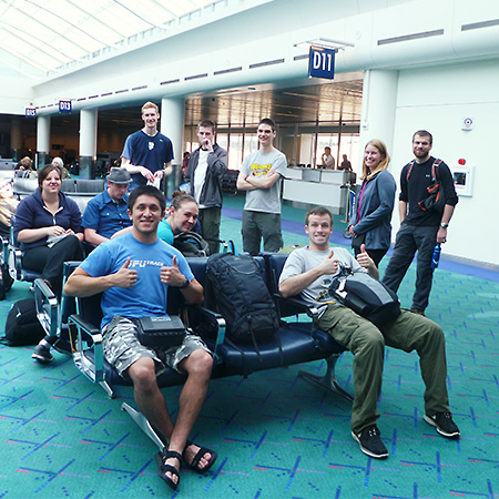 A group of students waiting to get boarded at the airport