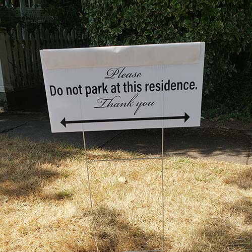 A Good Neighbor sign in a yard