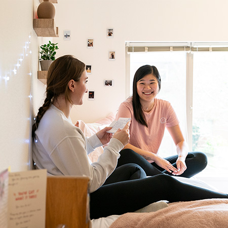 Students visiting friends in a residence hall