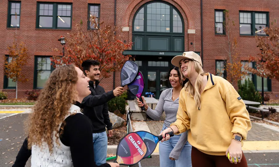 Students in the DPT program play pickleball together