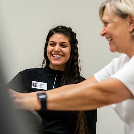 DPT student working with a patient