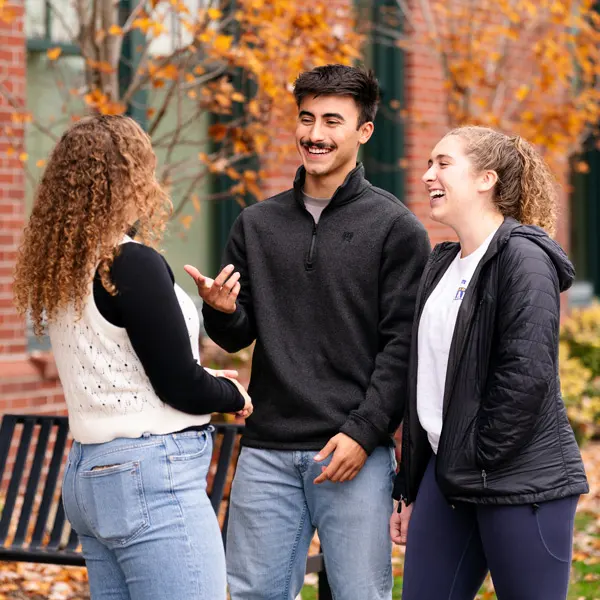 DPT students greet each other before class