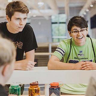 Students check in at the front desk in Hadlock Student Center.