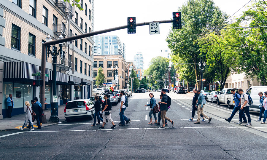 students walk around downtown Portland exploring the city