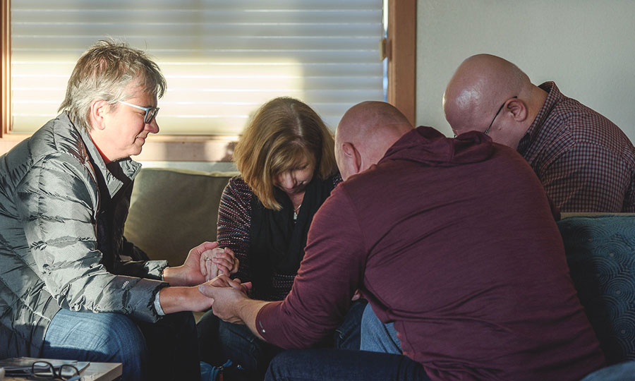 people praying together