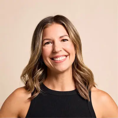 Portrait of Carissa Quinn, smiling big