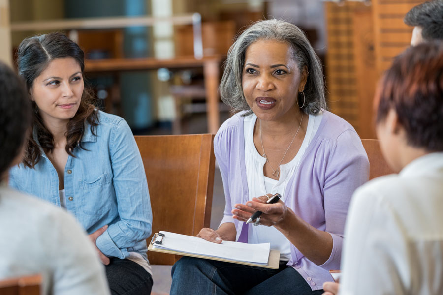 Woman leading a discussion session