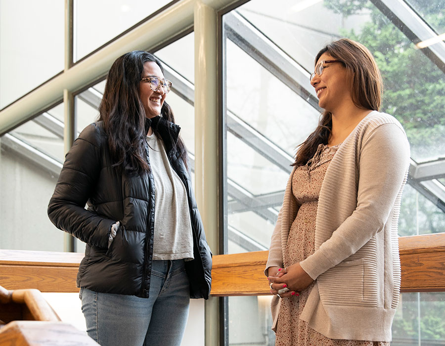 Two students talking with each other