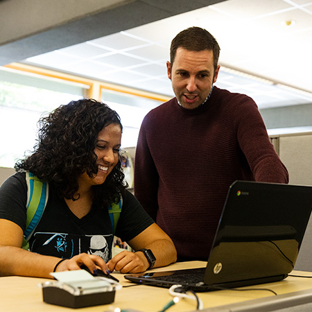 Career and Academic coach helping a student